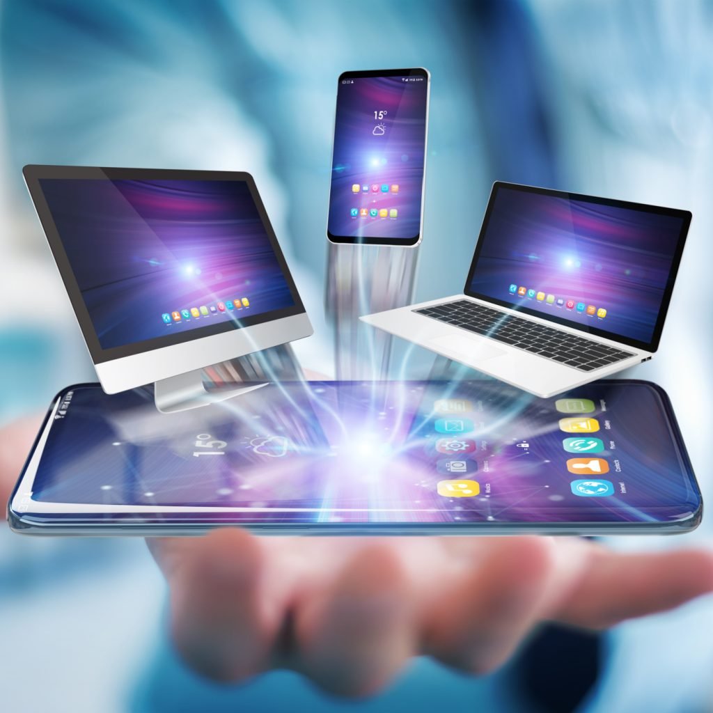Modern devices connected to each other in businessman hand 3D rendering